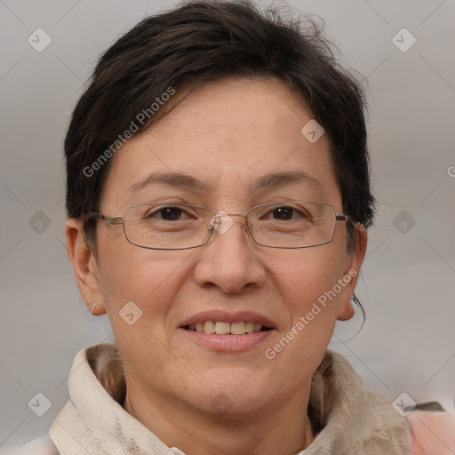 Joyful white adult female with medium  brown hair and brown eyes