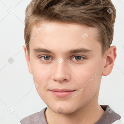 Joyful white child male with short  brown hair and brown eyes