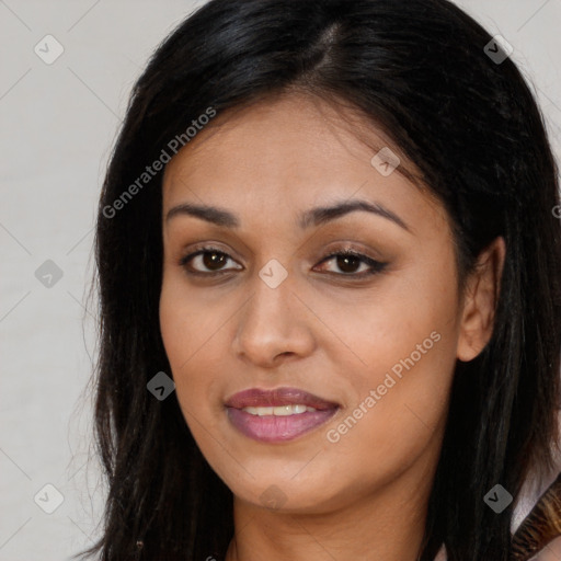Joyful latino young-adult female with long  brown hair and brown eyes
