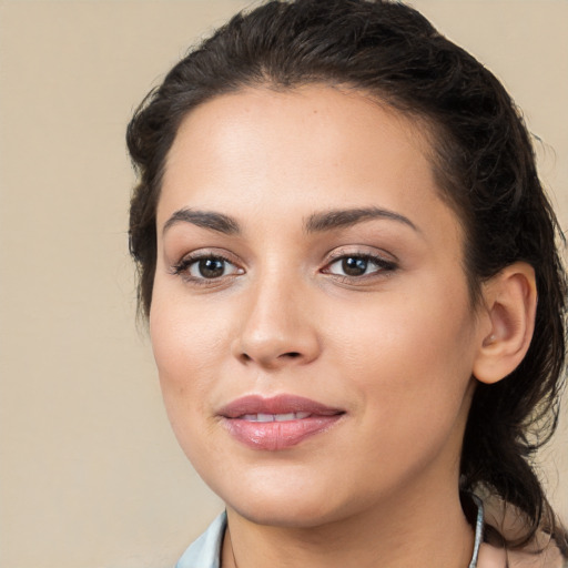 Joyful white young-adult female with medium  brown hair and brown eyes