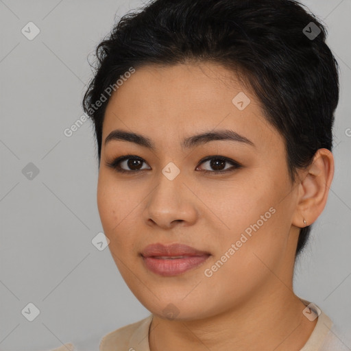 Joyful latino young-adult female with short  brown hair and brown eyes