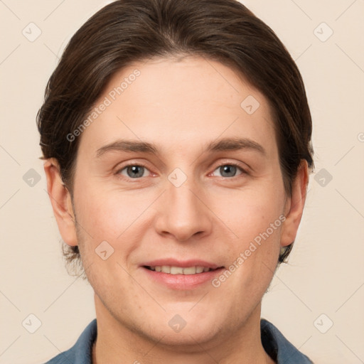 Joyful white young-adult female with short  brown hair and grey eyes