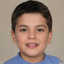 Joyful white child male with short  brown hair and brown eyes