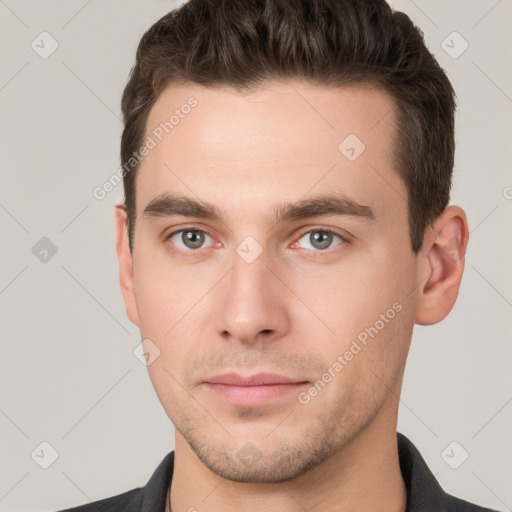 Neutral white young-adult male with short  brown hair and brown eyes