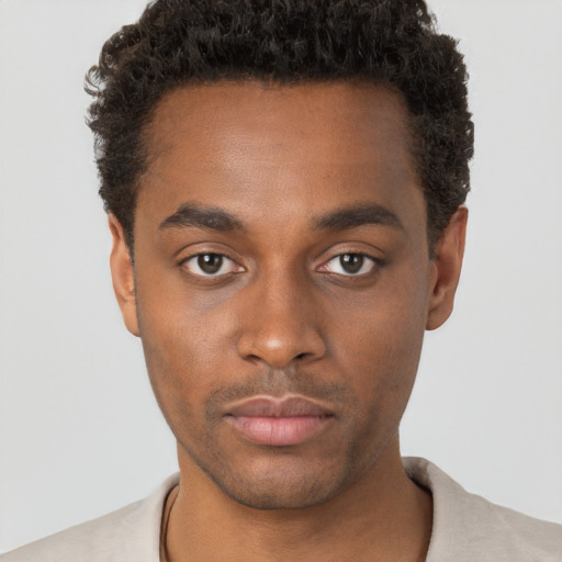 Neutral black young-adult male with short  brown hair and brown eyes