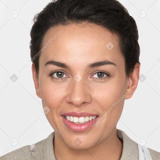 Joyful white young-adult female with short  brown hair and brown eyes