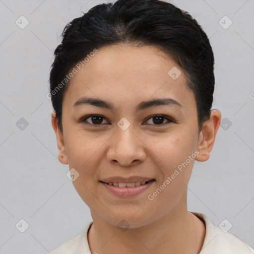 Joyful latino young-adult female with short  black hair and brown eyes