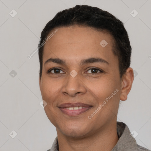 Joyful latino young-adult female with short  black hair and brown eyes