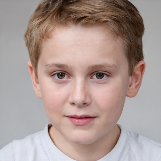 Joyful white child male with short  brown hair and brown eyes