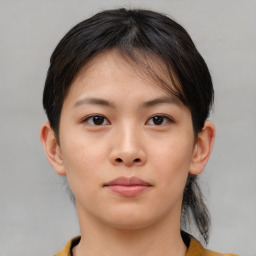 Neutral asian young-adult female with medium  brown hair and brown eyes