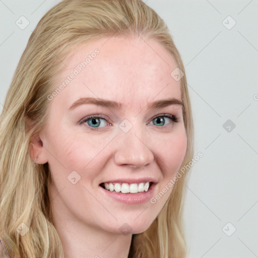 Joyful white young-adult female with long  brown hair and blue eyes