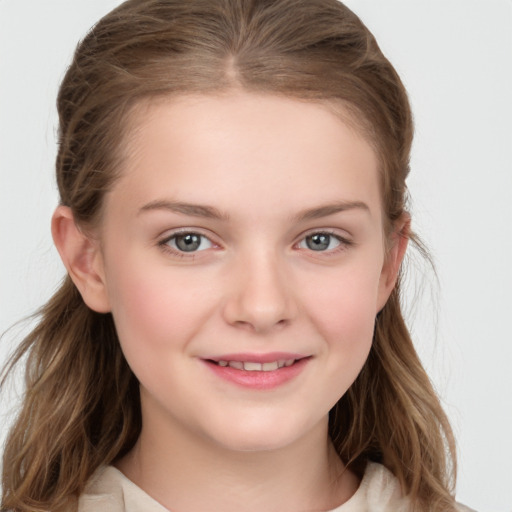 Joyful white child female with long  brown hair and grey eyes