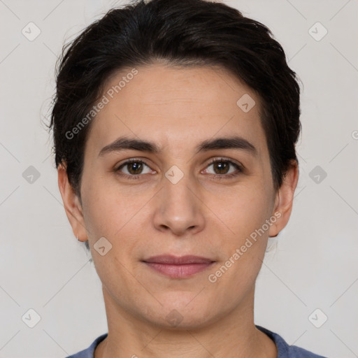 Joyful white young-adult female with short  brown hair and brown eyes