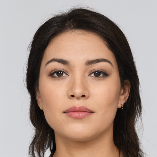 Neutral latino young-adult female with long  brown hair and brown eyes