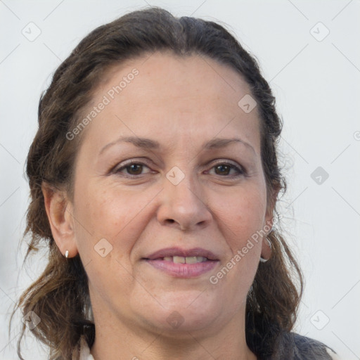 Joyful white adult female with medium  brown hair and grey eyes