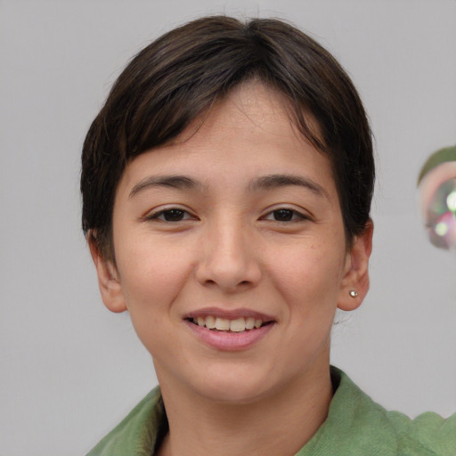 Joyful asian young-adult female with short  brown hair and brown eyes