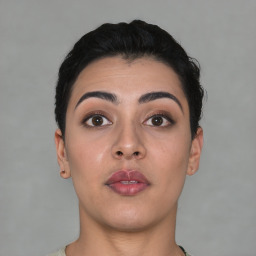 Neutral asian young-adult female with short  brown hair and brown eyes