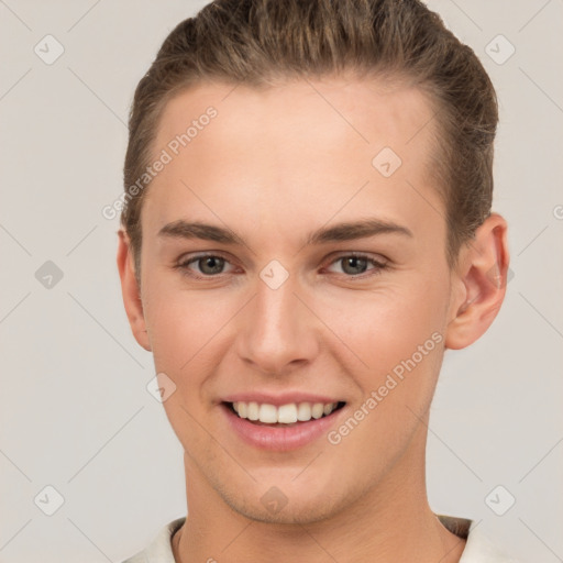 Joyful white young-adult female with short  brown hair and brown eyes