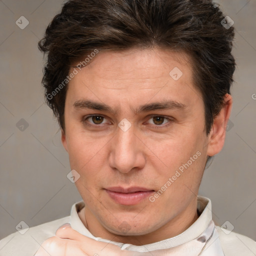 Joyful white adult male with short  brown hair and brown eyes