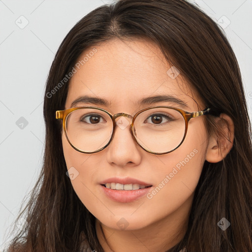 Joyful white adult female with long  brown hair and brown eyes