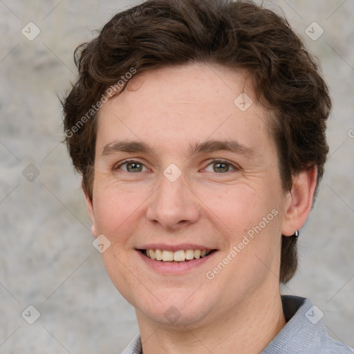 Joyful white adult male with short  brown hair and grey eyes