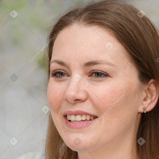 Joyful white adult female with medium  brown hair and brown eyes