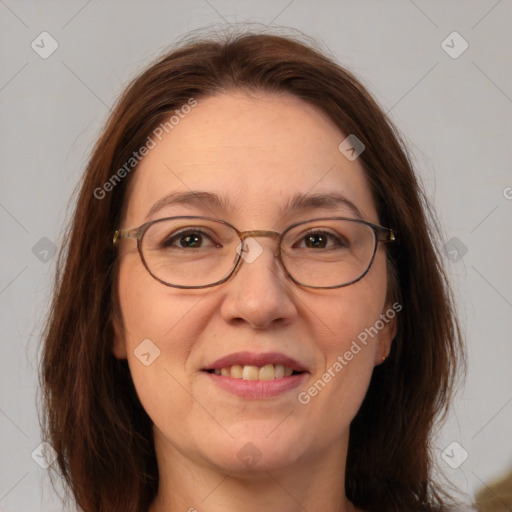 Joyful white adult female with medium  brown hair and brown eyes