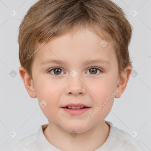 Joyful white child male with short  brown hair and brown eyes