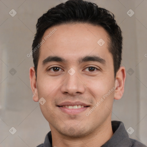 Joyful white young-adult male with short  black hair and brown eyes