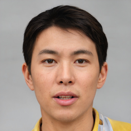 Neutral asian young-adult male with short  brown hair and brown eyes