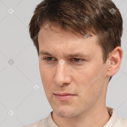 Neutral white adult male with short  brown hair and brown eyes