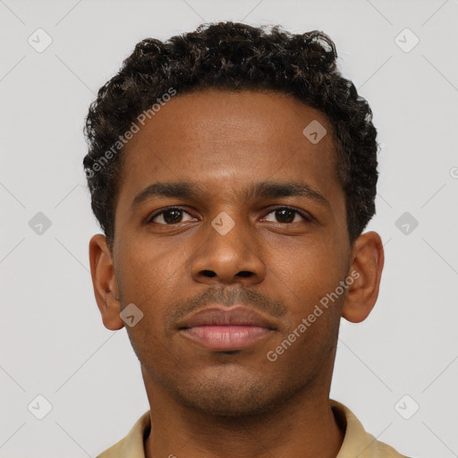 Neutral black young-adult male with short  brown hair and brown eyes