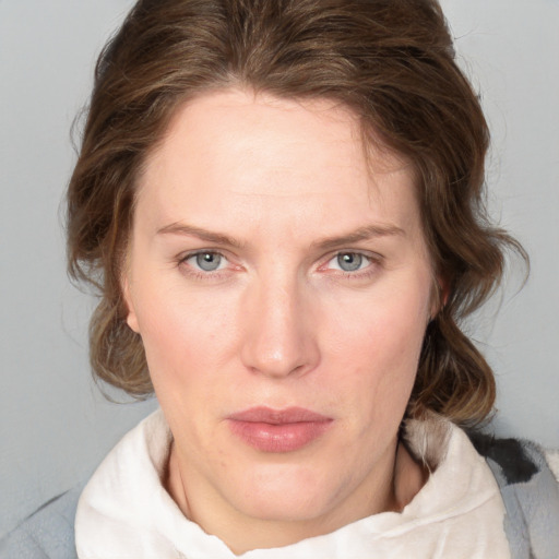 Neutral white adult female with medium  brown hair and blue eyes