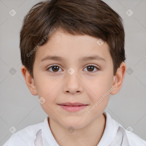 Joyful white child male with short  brown hair and brown eyes