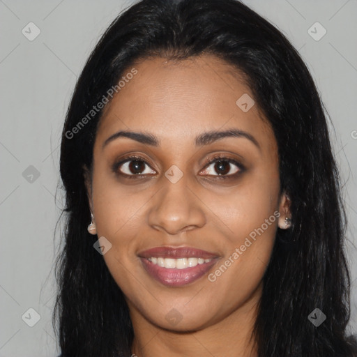 Joyful latino young-adult female with long  black hair and brown eyes