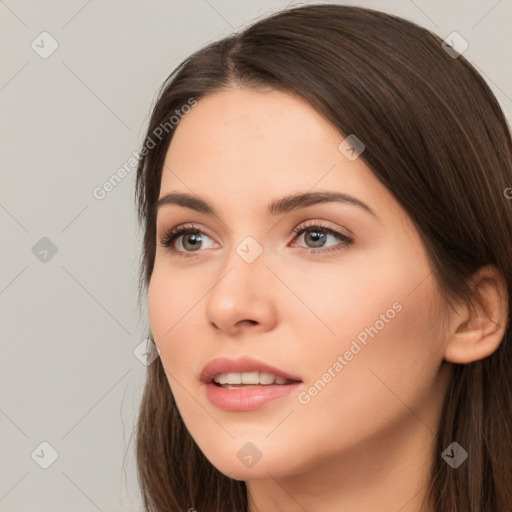 Neutral white young-adult female with long  brown hair and brown eyes