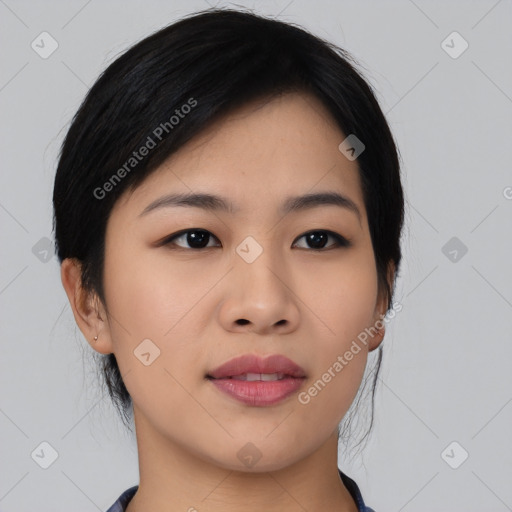 Joyful asian young-adult female with medium  black hair and brown eyes