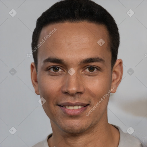 Joyful white young-adult male with short  black hair and brown eyes