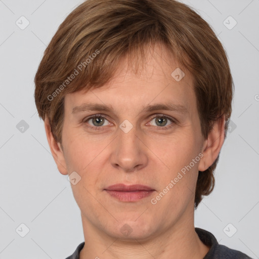 Joyful white adult male with short  brown hair and grey eyes