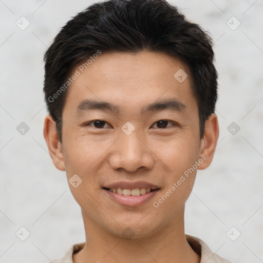 Joyful asian young-adult male with short  black hair and brown eyes