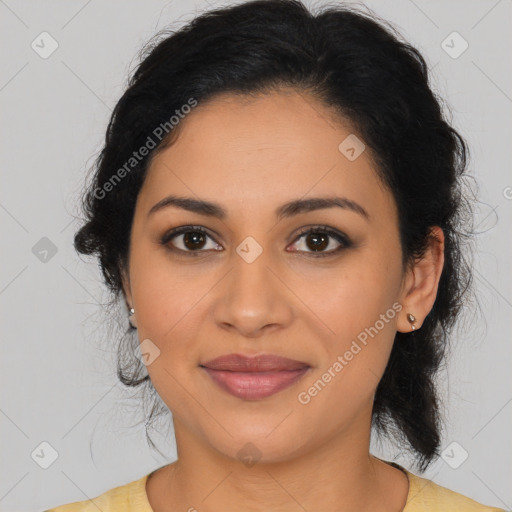 Joyful latino young-adult female with medium  brown hair and brown eyes