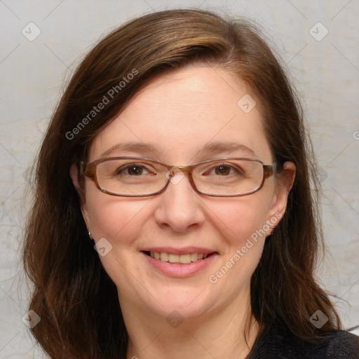 Joyful white adult female with medium  brown hair and blue eyes