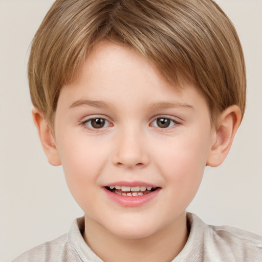 Joyful white child male with short  brown hair and brown eyes