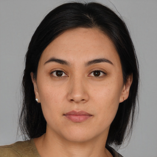 Neutral asian young-adult female with medium  brown hair and brown eyes