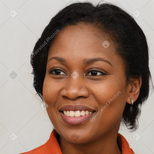 Joyful black young-adult female with long  brown hair and brown eyes