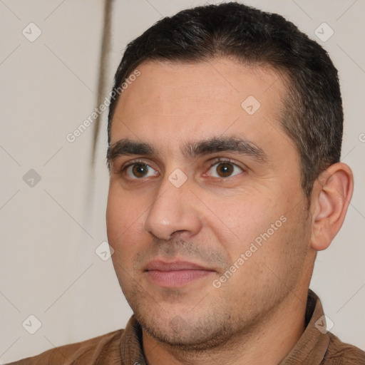 Joyful white young-adult male with short  brown hair and brown eyes