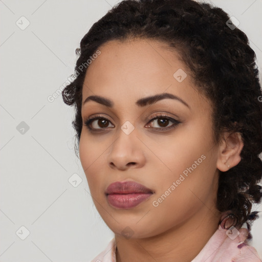 Joyful latino young-adult female with medium  black hair and brown eyes