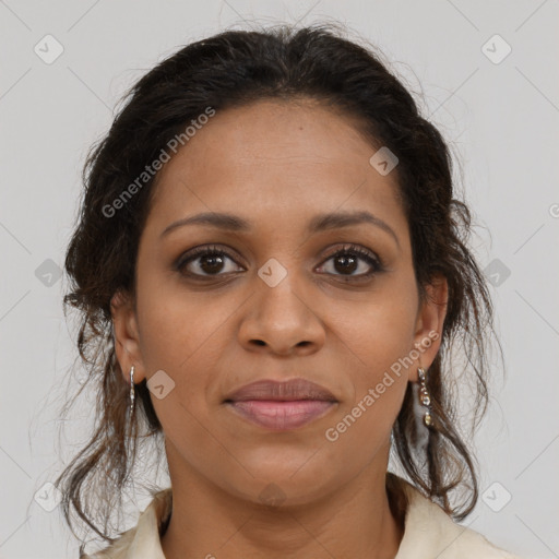 Joyful black young-adult female with long  brown hair and brown eyes