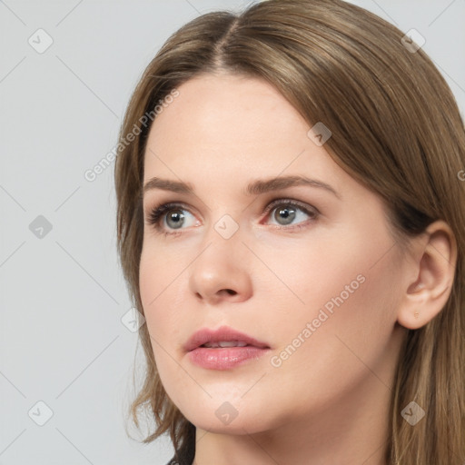 Neutral white young-adult female with long  brown hair and brown eyes