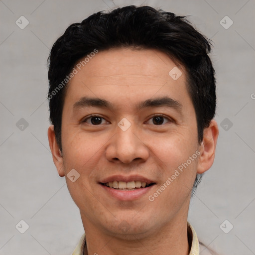 Joyful white young-adult male with short  black hair and brown eyes